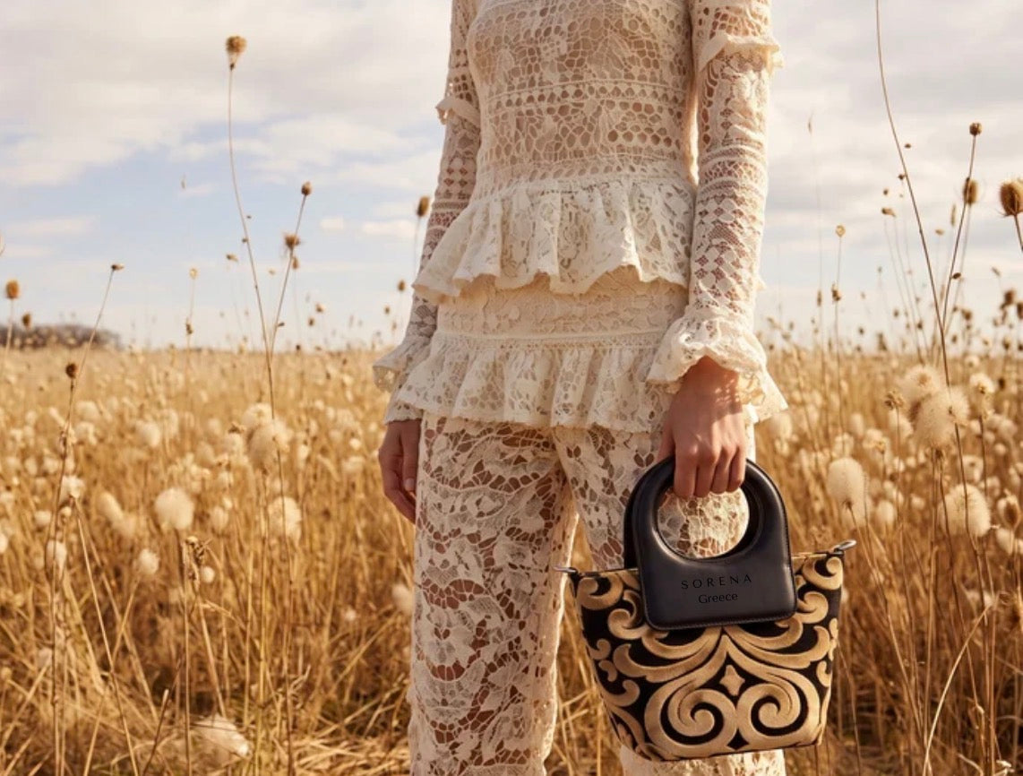 CASSANDRA MINI STATEMENT TOP HANDLEBAG