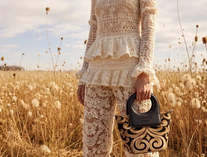CASSANDRA MINI STATEMENT TOP HANDLEBAG